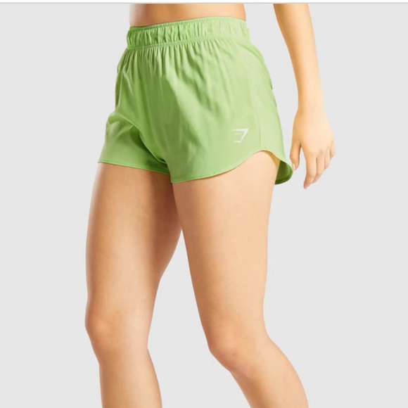 Gymshark Pants - GYMSHARK - ESSENTIAL LOOSE TRAINING SHORTS PASTEL LIME GREEN